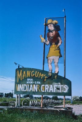 Billboard, Mangum's Indian Crafts on Route 91 in Blackfoot, Idaho - Classic Black & White Print In The Living Room