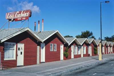 Log Cabin Motel, Closer Front View on 830 Market Street in Morro Bay, California