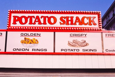 Potato Shack Sign in Ocean City, Maryland - Classic Black & White Print On A Wall