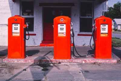 Three Red Gas Pumps on S. Flores in San Antonio, Texas - Classic Black & White Print On A Wall